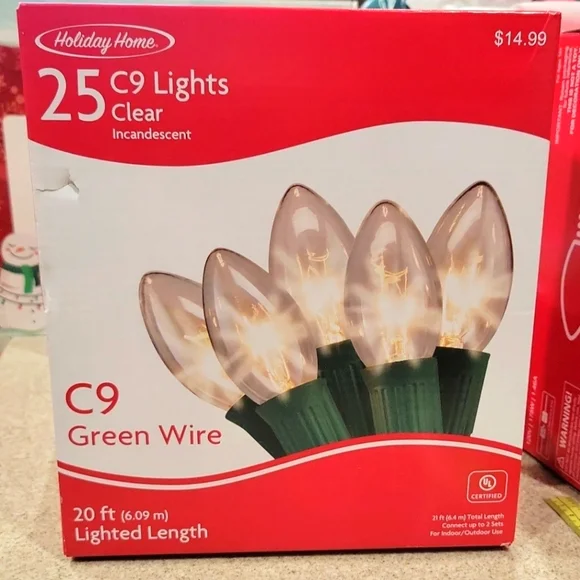 New Holiday Home 25 bulb ct c9 clear bulbs green string lights. 21' total length