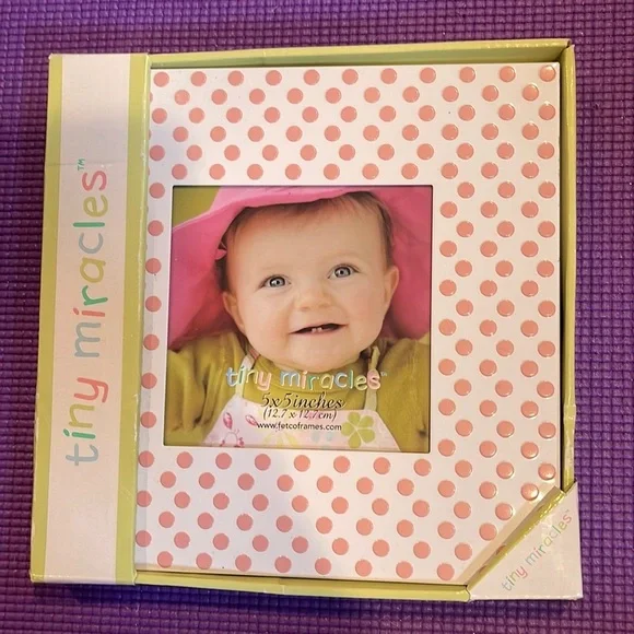 Picture frame. Holds 5 x 5 photo. Brand new.