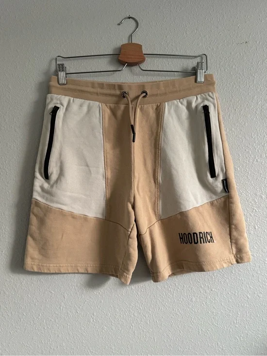 M Hoodrich Tan/Beige Color Block Shorts, drawstring waist & zippered pockets.
