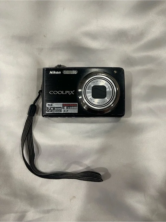 Nikon COOLPIX Compact Digital Camera - Black and Silver Accents