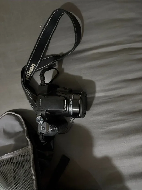 Nikon Black Compact Digital Camera with Neck Strap