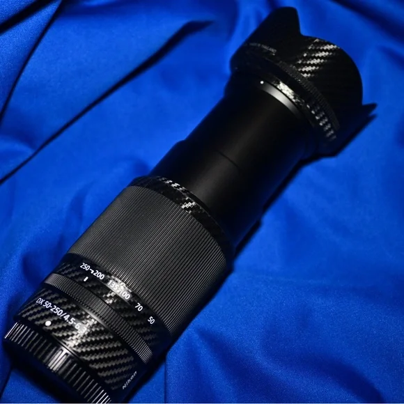 NIKKOR Z dx 50-250mm f/4.5-6.3 VR Lens with HB-90A Lens Hood & Carbon Fiber Skin