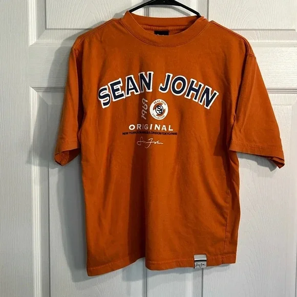 Sean John boys orange tee - size Medium (12/14)