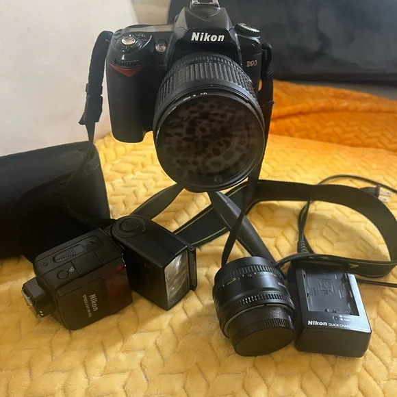 Nikon D90 with two lens and the flash