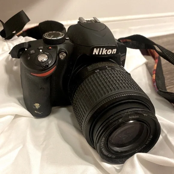 Nikon D3200 ($300) and 55-200 lens (200)