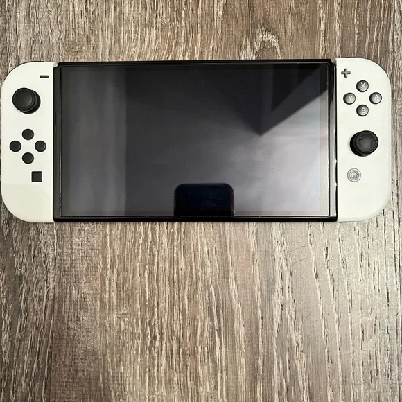 White Handheld Gaming Console with Removable White Controllers - Nintendo