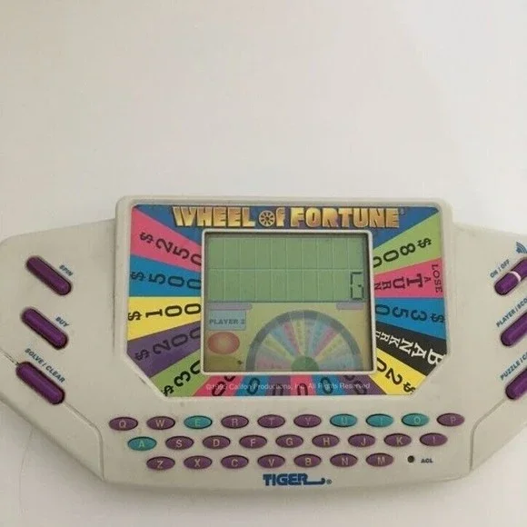 tiger electronics wheel of fortune with 1game No Batteries included