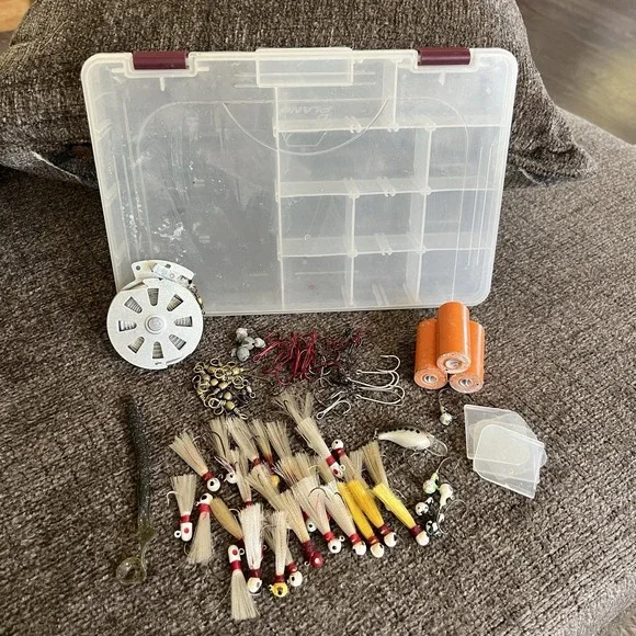 Plano Tackle Box Lot with Rebel Lure Bucktail Jigs Hooks Swivels and Hand Reel