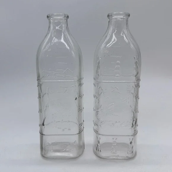 Vintage Embossed Glass Milk Bottle Dog and Rabbit Scene Set of 2