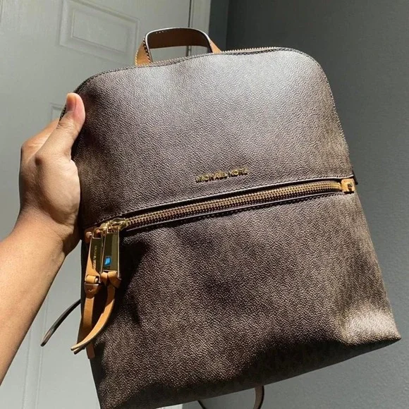 The Michael Kors Rhea Slim signature backpack