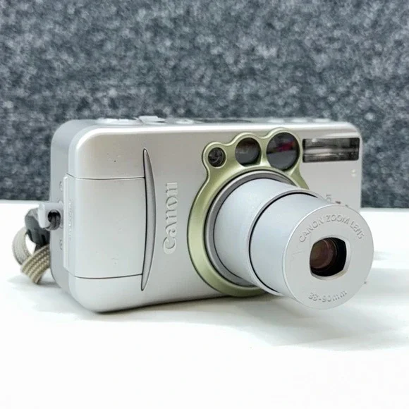 Canon Sure Shot 90u Date 35mm Film Camera 38-90mm Zoom Lens Silver with Case