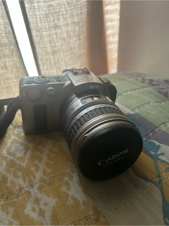 Vintage Canon Silver EOS IX Camera with Zoom Lens
