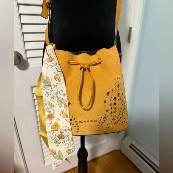 Michael by Michael Kors “Cary” NWT Mustard Bucket Bag with matching Wallet.