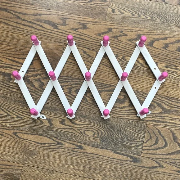 White and Pink Expandable Wall Rack