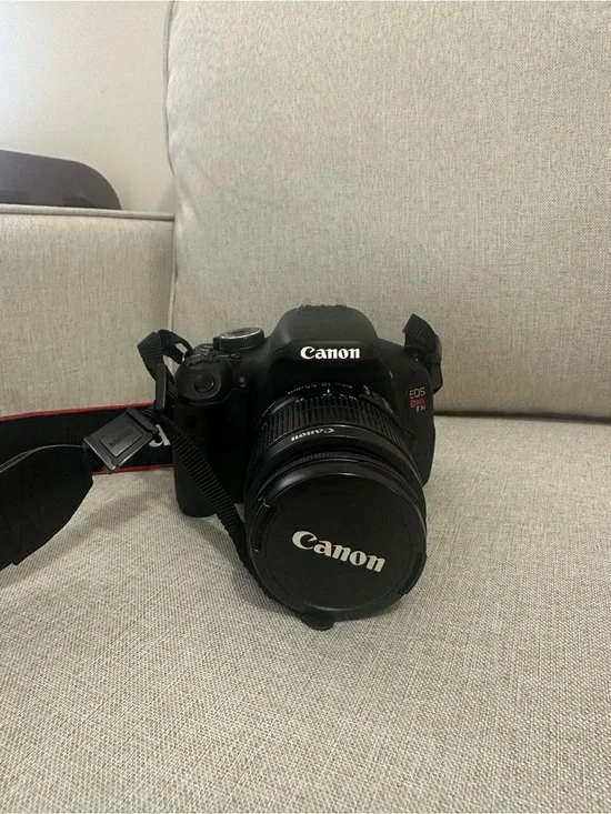 Canon DSLR Camera in Black with Red-Trim Strap