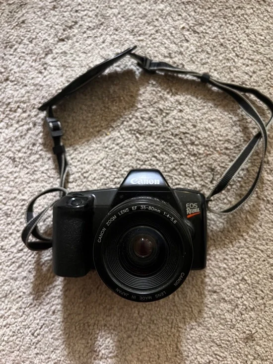 Canon Black SLR Camera with 35-80mm Zoom Lens
