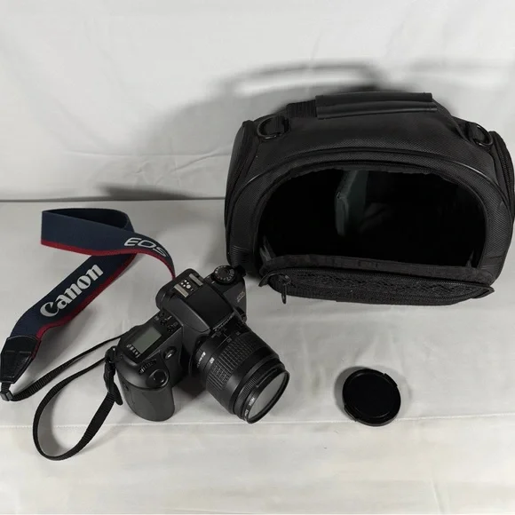 Canon Black Digital Camera with Lens and Strap