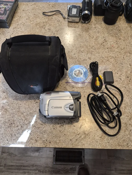 Canon Model # DC-320 Silver DVD Camcorder with Accessories