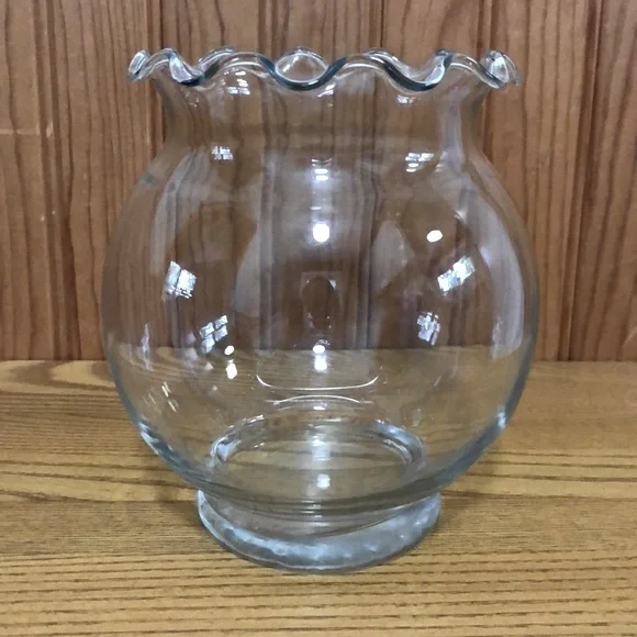 Footed ruffle top glass globe vase