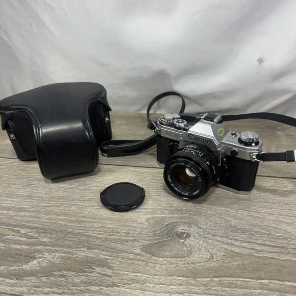 Canon AE-1 35mm SLR Film Camera silver body FD 50mm f1.8 sc lens JAPAN Mint