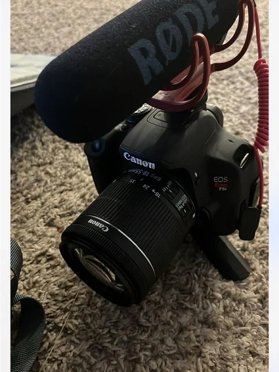 Canon Black DSLR Camera with Rode Microphone and Black Zoom Lens