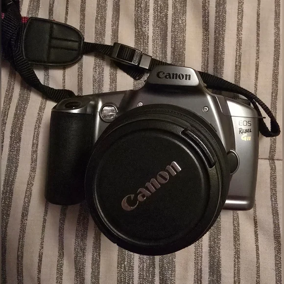 Canon EOS Rebel GII 35mm SLR Camera - Silver & Black with shoulder strap