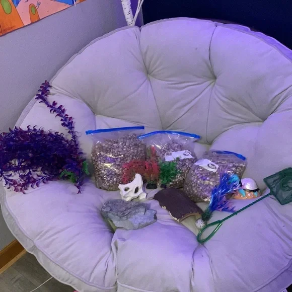 seaweed, big rock, white rock, log, three bags of rocks.