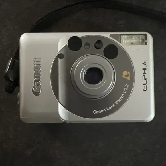 Canon Elph Jr Handheld Built-in Flash 26mm APS Film Camera With Battery Included
