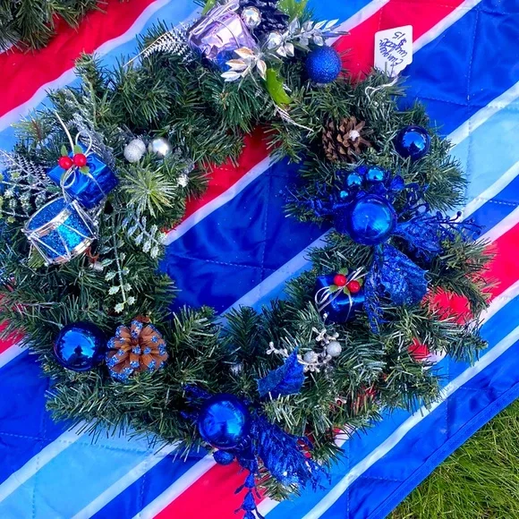 Evergreen Wreath Trimmed with silver and blue and pine ones