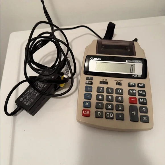 Canon P23-DH Calculator in Cream and Black.