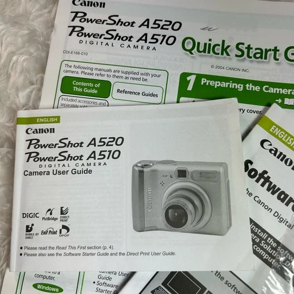 CANON POWER SHOT A520 BOOKLETS DISK AND CORDS NO CAMERAS