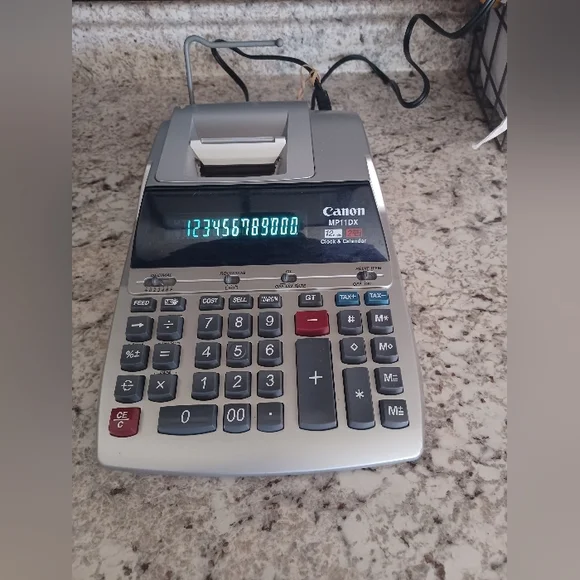 Canon digital printable calculator with time and calendar feature