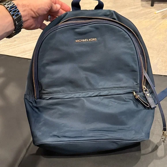 MICHAEL MICHAEL KORS navy Backpack with gold hardware GUC