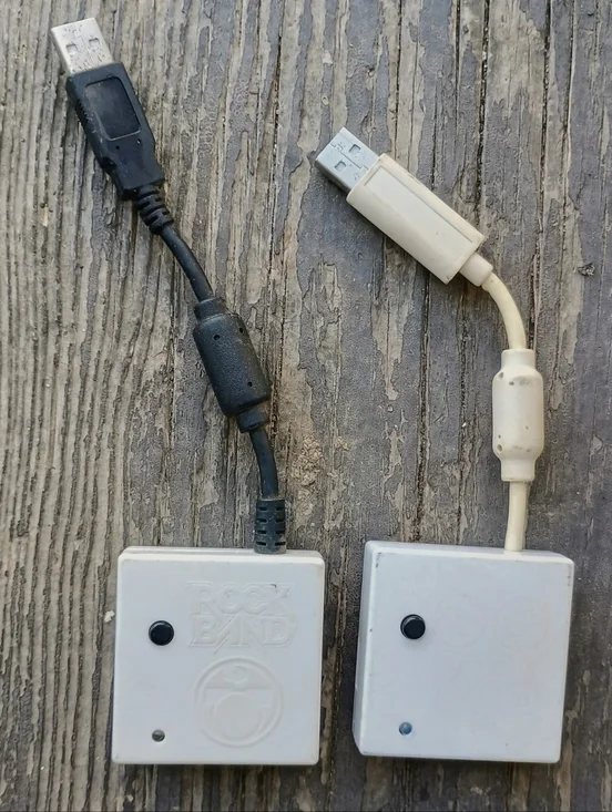 Rock Band USB Dongles in Off-White and Black
