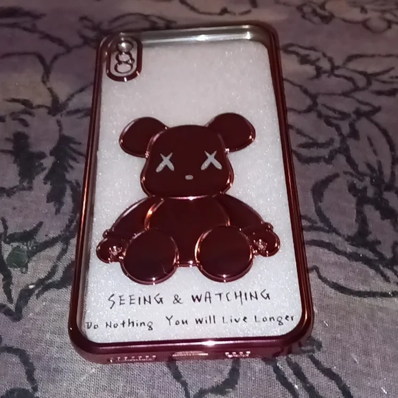 Pink, shiney teddy bear, cell phone cover.