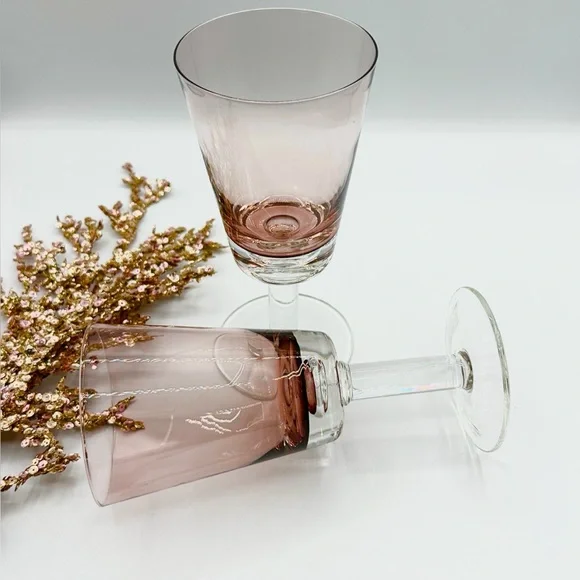 2 Crate & Barrel Amethyst Glasses. Bit of Pink and Purple Tones