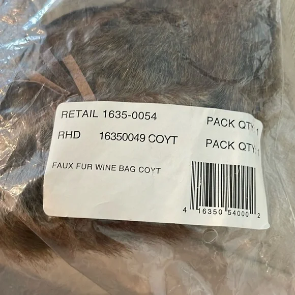 Pottery Barn faux fur wine bag in Coyote. Brand new and unused.