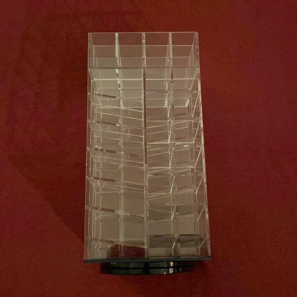 Acrylic spinning lipstick tower