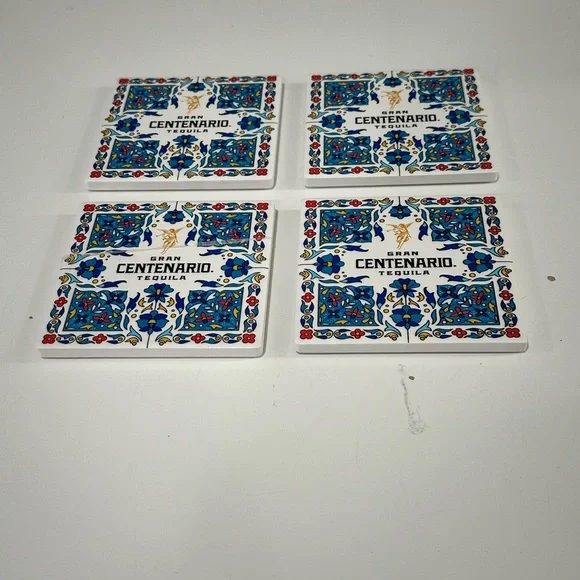 4 set gran Centenario tequila colorful tile coasters. Cork bottom.