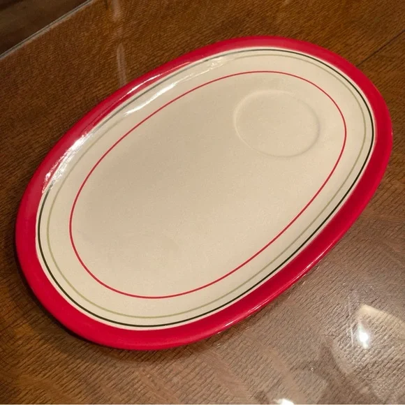 Crate & Barrel red and cream oval plate