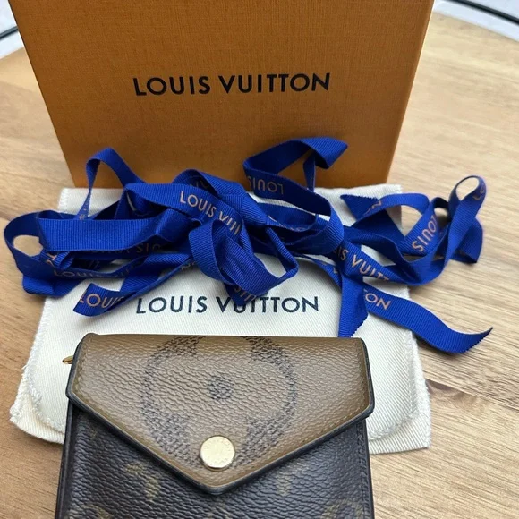 Louis Vuitton Reverse Monogram Zoe Wallet