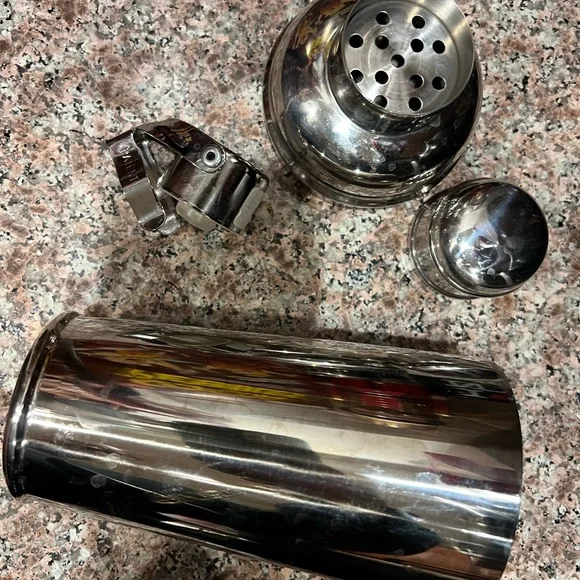 Crate & Barrel stainless steel shaker & champagne stopper