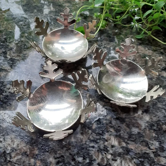 Crate & Barrel metal snowflake candle holders