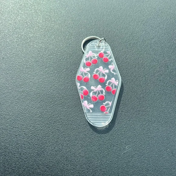 Adorable cherry keychain with bows