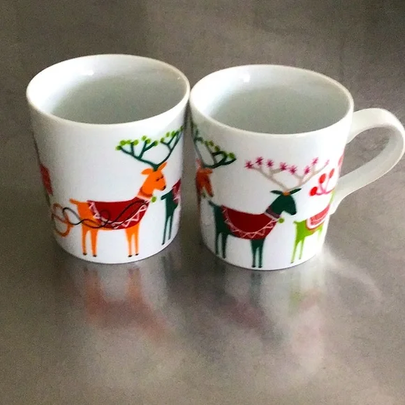 Two Crate & Barrel 6oz. Reindeer and sleigh mugs by Jenny Bowers.