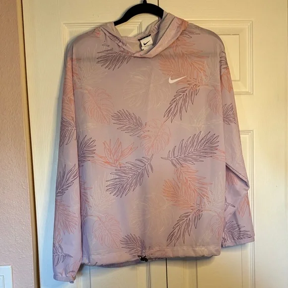 Nike Pro Cover Up Hoodie in a purple aloha print. Size L