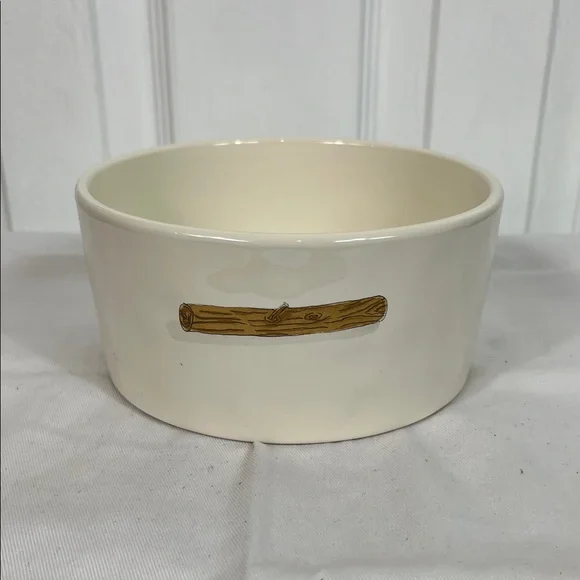 NWOT Rae Dunn white dog bowl 6”wide, 3”tall. Stick on front, WOOF inside bottom