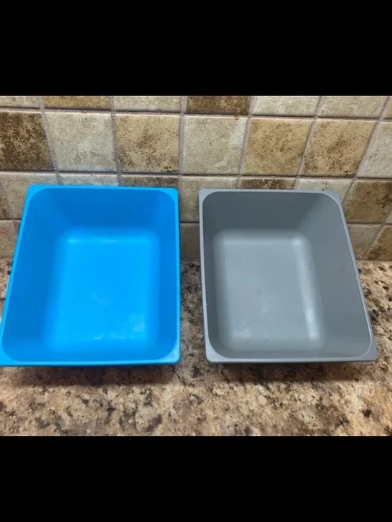 IKEA VARIERA blue and grey plastic square cereal bowls.