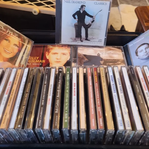 Many CD's With Black CD Storage Case