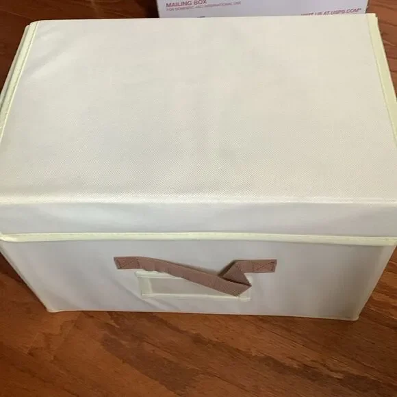 Four Piece foldable storage bins for office or home in beige. 15X10X10